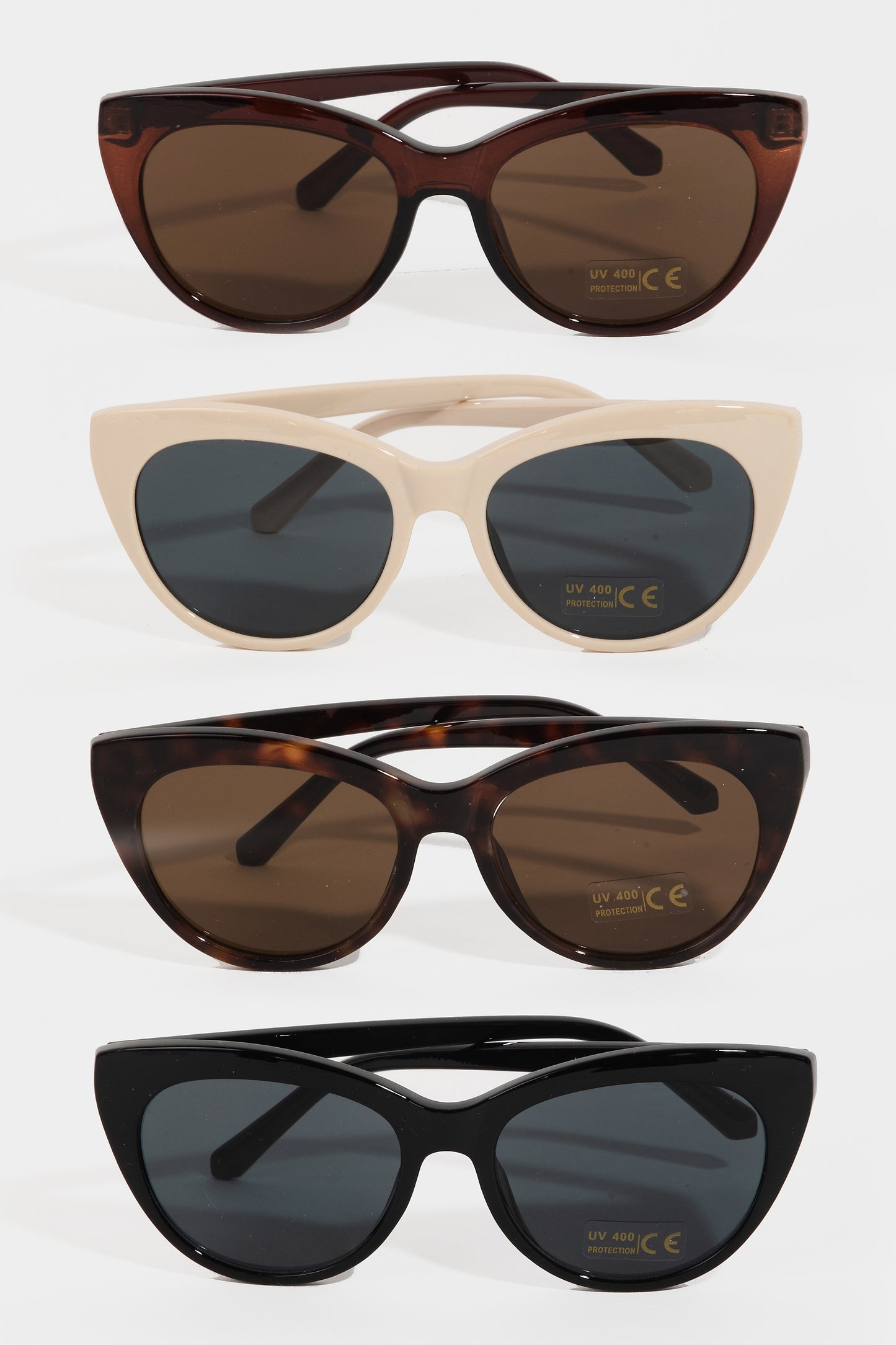Four pairs of cat-eye sunglasses with different frame colors on a white background.