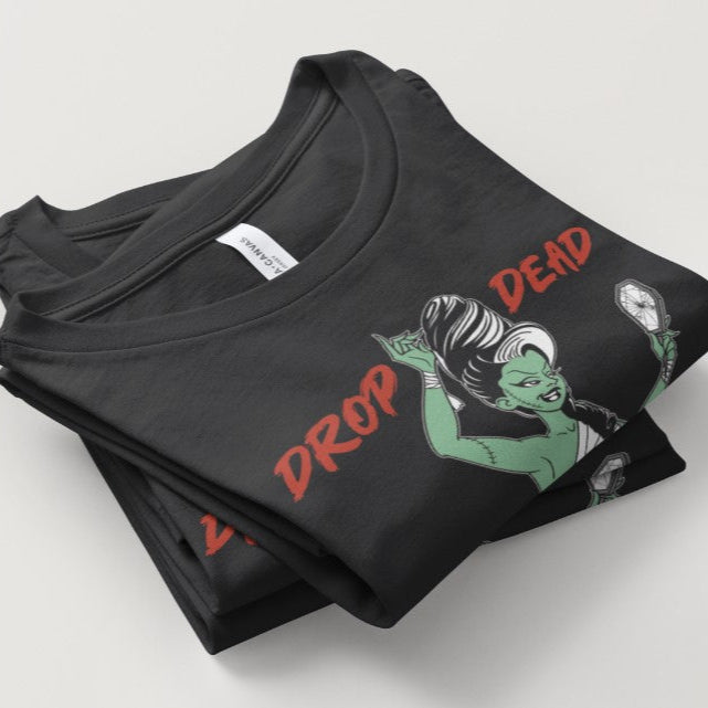 Black t-shirt with graphic design and text on a light gray background