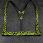 Green snake print harness on a dark gray background