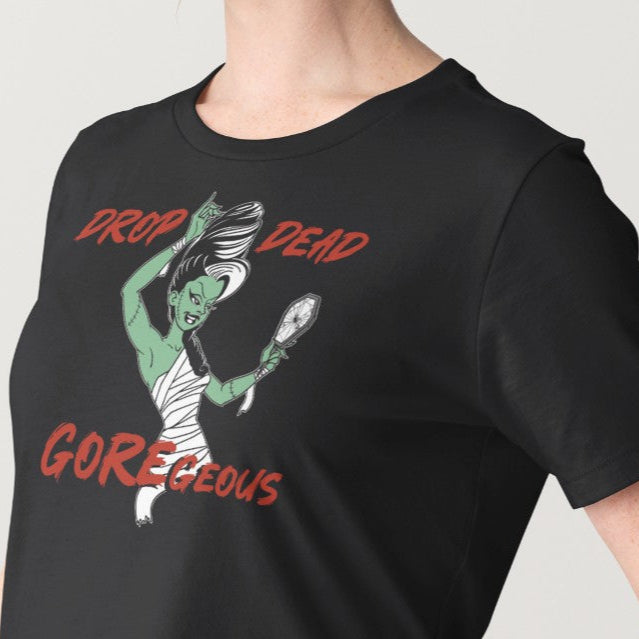 Black t-shirt with graphic design and text 'DROP DEAD GORGEOUS' on a plain background