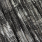 Close-up of textured black and white fabric pattern