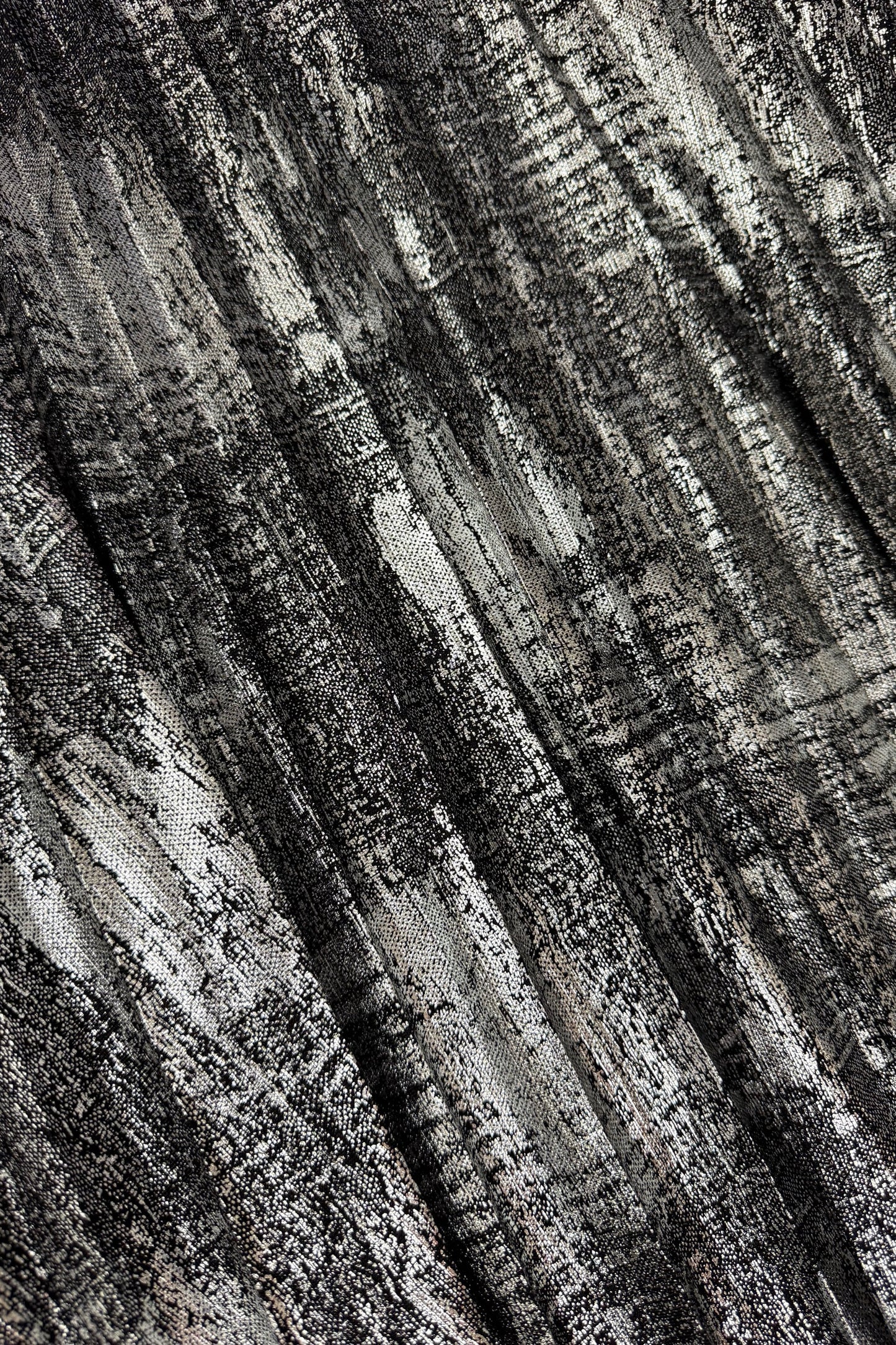 Close-up of textured black and white fabric pattern